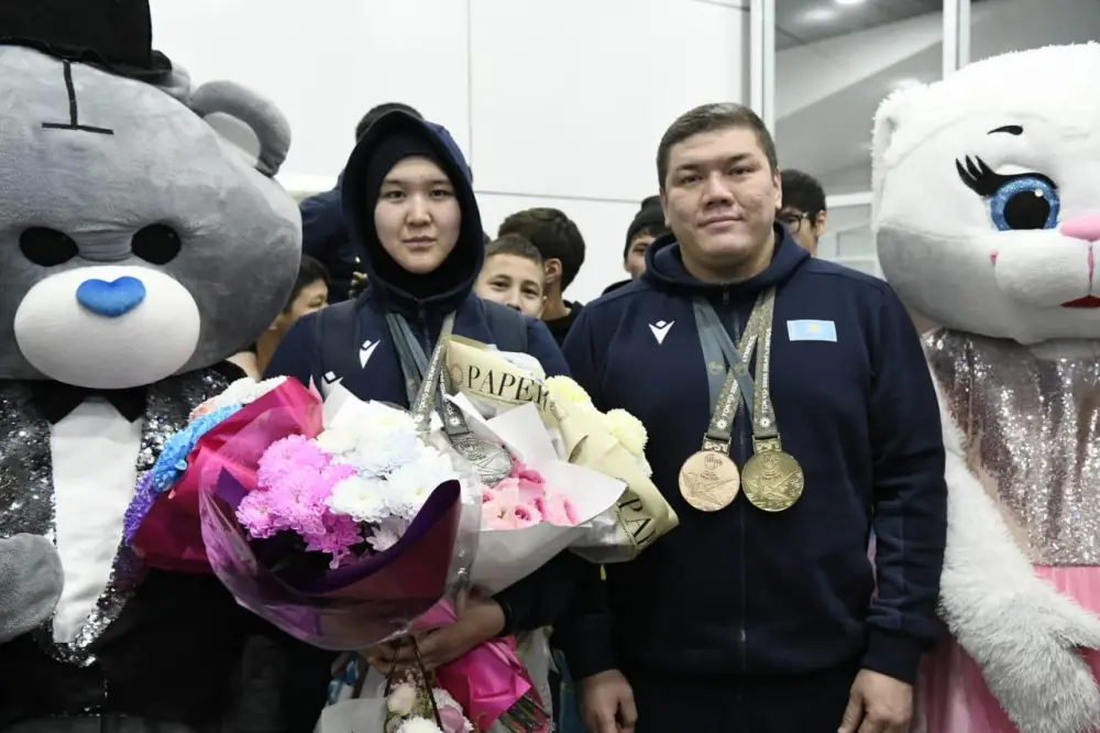 Столичные спортсмены, защищавшие честь страны в Японии, вернулись домой (5)