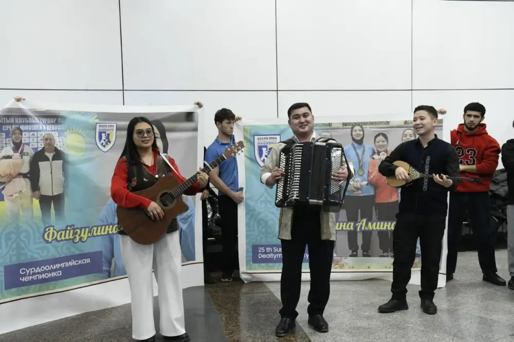 Столичные спортсмены, защищавшие честь страны в Японии, вернулись домой (6)
