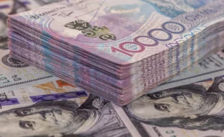 Нацбанк Казахстана призывает отказаться от накоплений в долларах